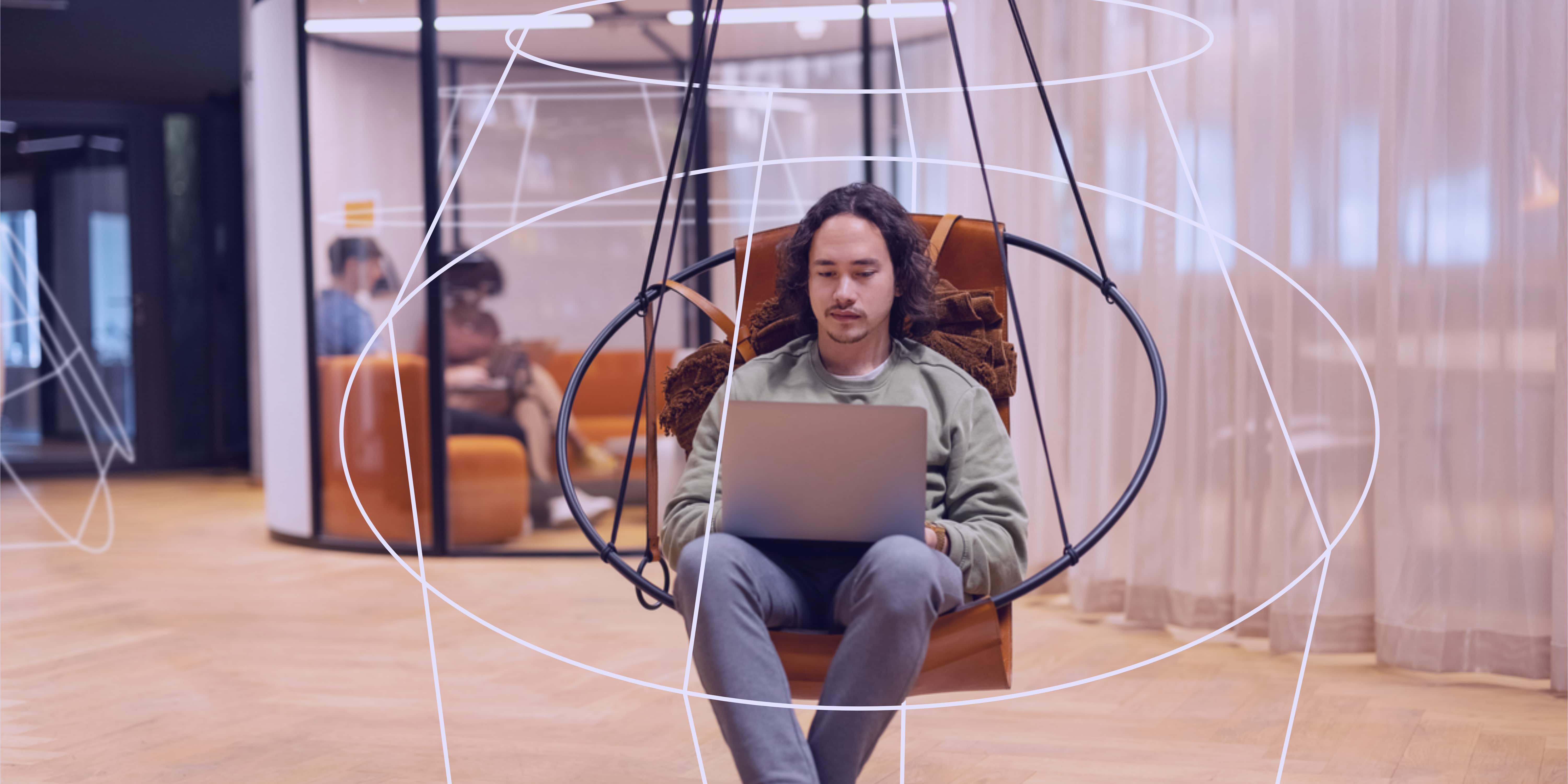 employee working in hybrid workplace in a round chair