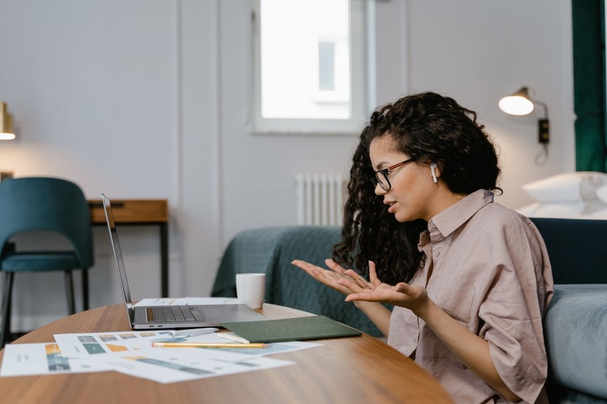 Woman on video call conference at home